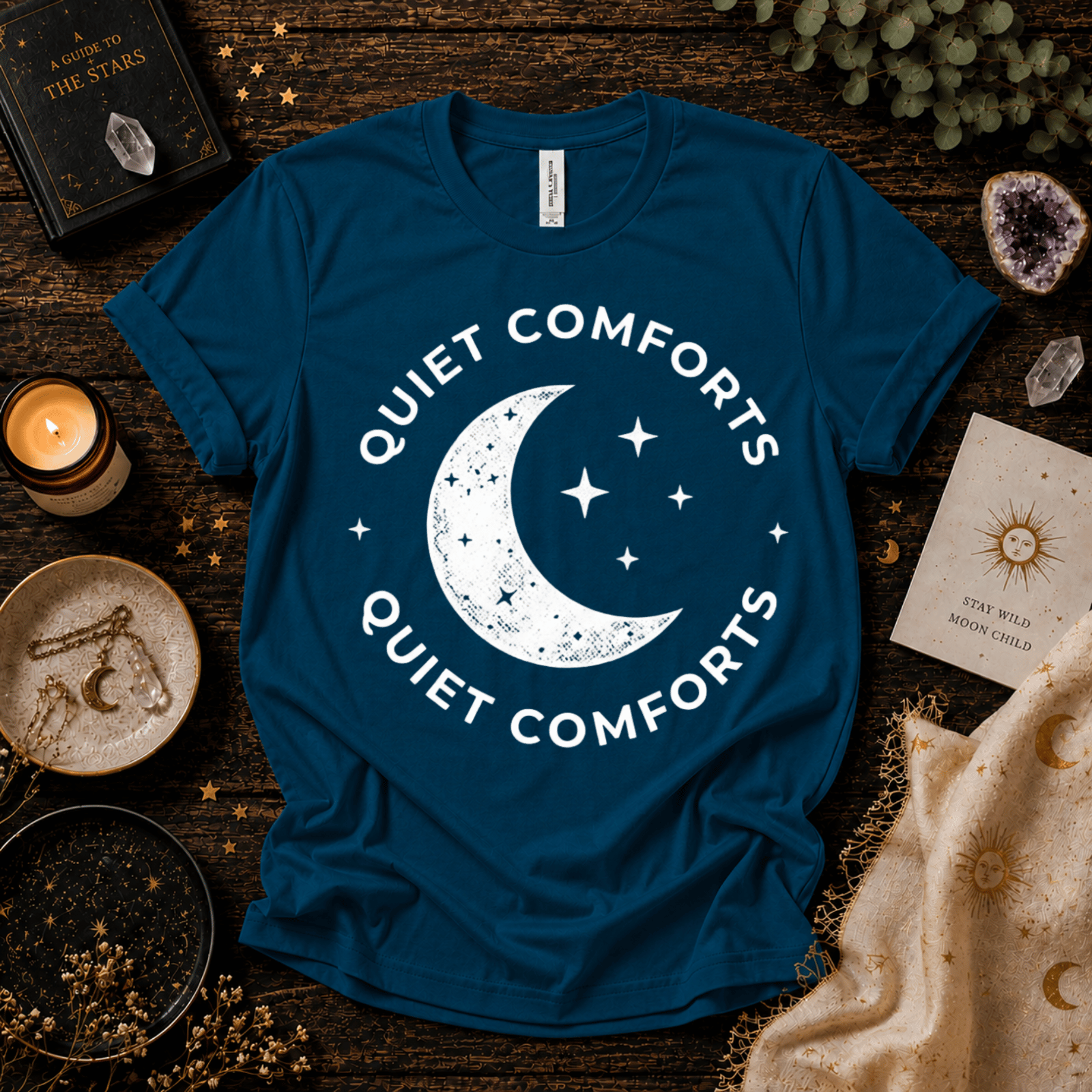 Quiet Comforts magic celestial graphic t-shirt cozy flat lay in deep teal.