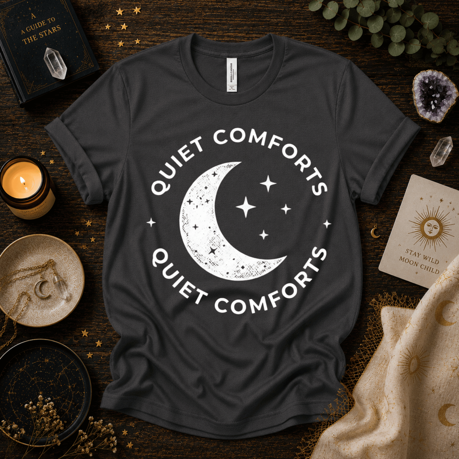 Quiet Comforts magic celestial graphic t-shirt cozy flat lay in asphalt.