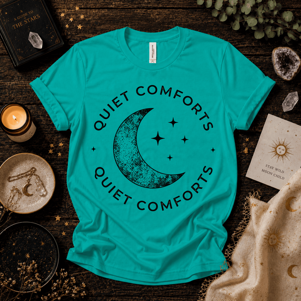 Quiet Comfort black print celestial  graphic t-shirt cozy flat lay in heather sea green.