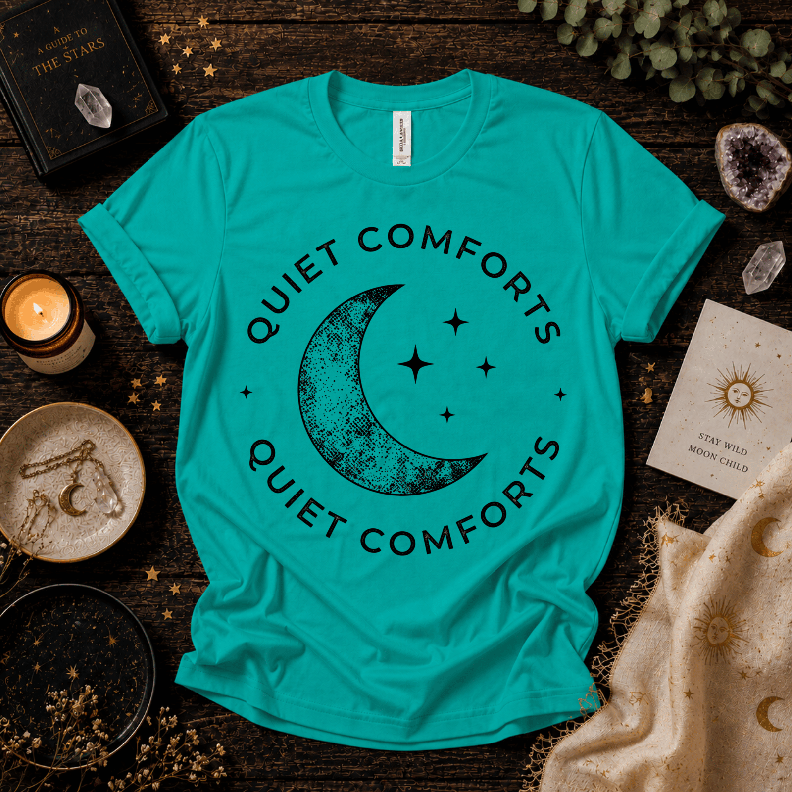 Quiet Comfort black print celestial  graphic t-shirt cozy flat lay in heather sea green.