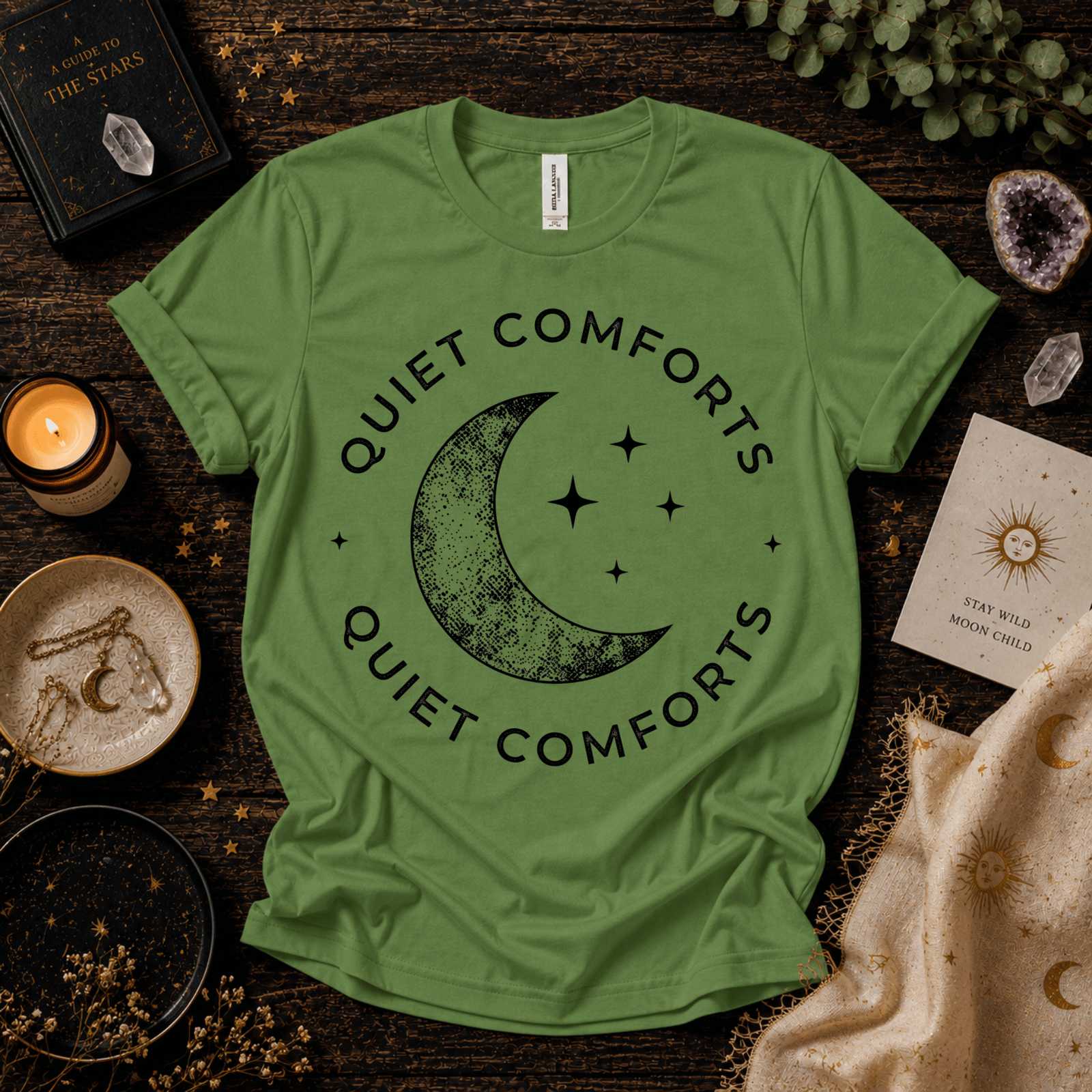 Quiet Comfort black print celestial  graphic t-shirt cozy flat lay in leaf.