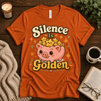 Silence Is Golden funny introvert graphic t-shirt cozy flat lay in burnt orange.