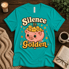 Silence Is Golden funny introvert graphic t-shirt cozy flat lay in heather sea green.