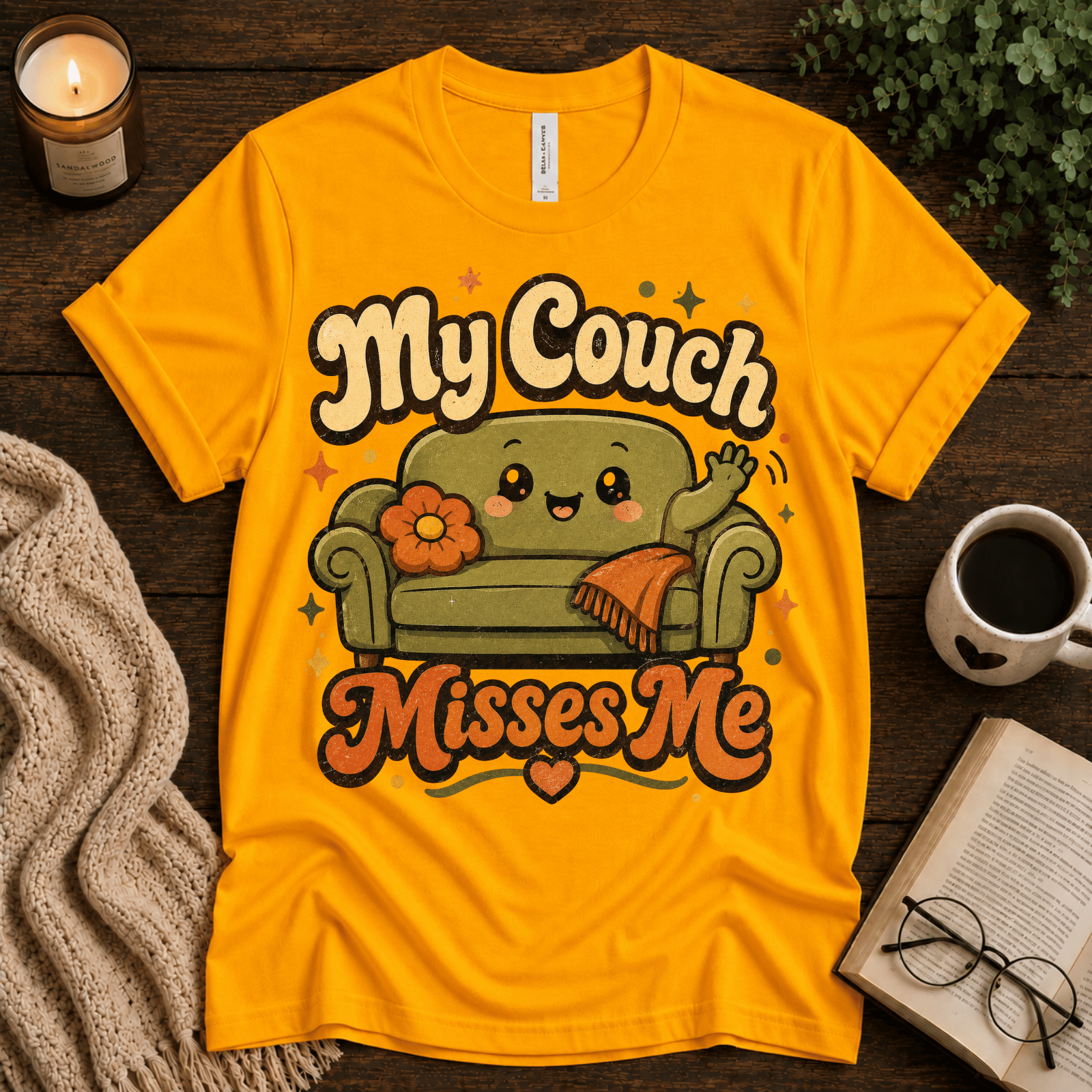 My Couch Misses Me funny introvert graphic t-shirt cozy flat lay in gold.