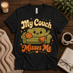 My Couch Misses Me funny introvert graphic t-shirt cozy flat lay in vintage black.