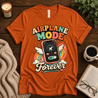 Airplane Mode funny introvert graphic t-shirt cozy flat lay in burnt orange.