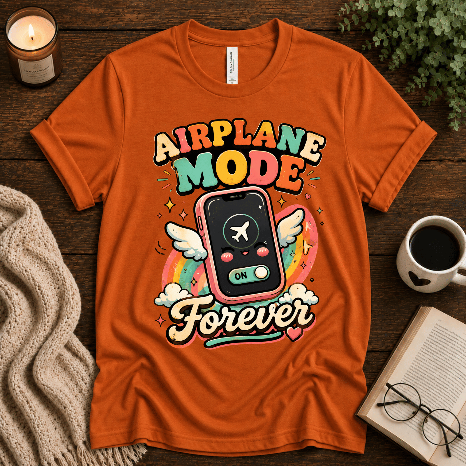 Airplane Mode funny introvert graphic t-shirt cozy flat lay in burnt orange.