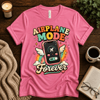 Airplane Mode funny introvert graphic t-shirt cozy flat lay in charity pink.