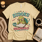 Sudoku Maniac funny introvert graphic t-shirt cozy flat lay in natural.