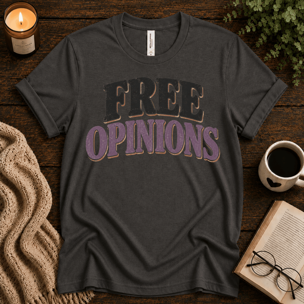 Free Opinions funny introvert graphic t-shirt cozy flat lay in asphalt.