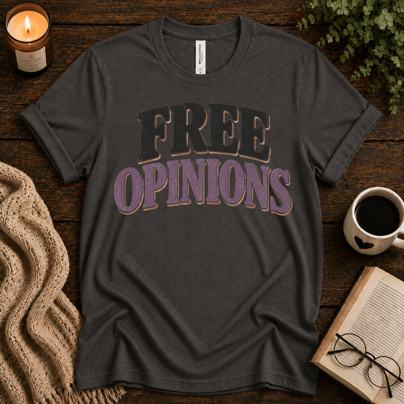 Free Opinions funny introvert graphic t-shirt cozy flat lay in asphalt.