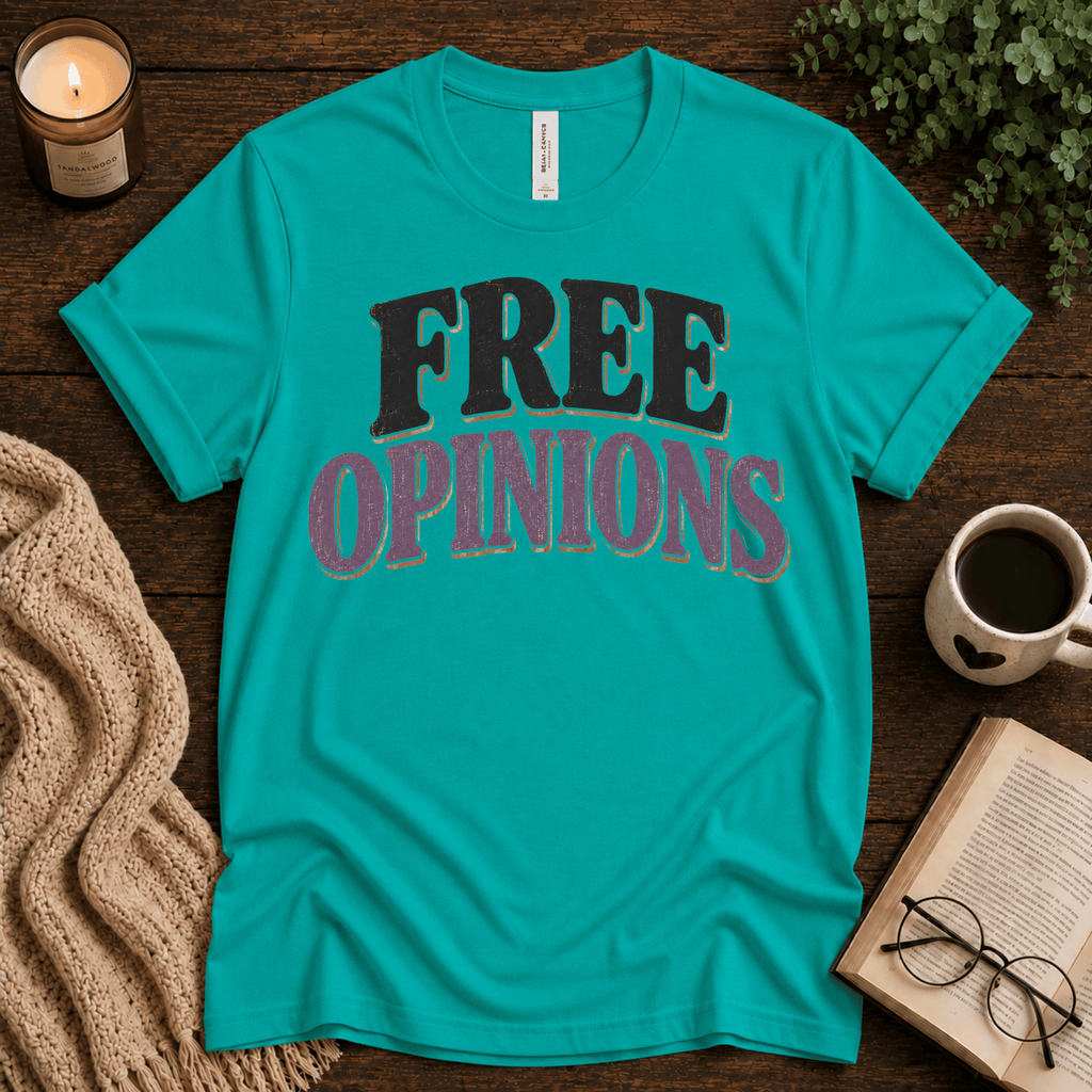 Free Opinions funny introvert graphic t-shirt cozy flat lay in heather sea green.