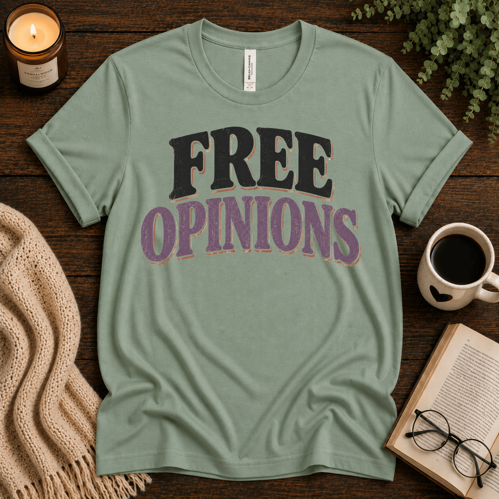 Free Opinions funny introvert graphic t-shirt cozy flat lay in sage.