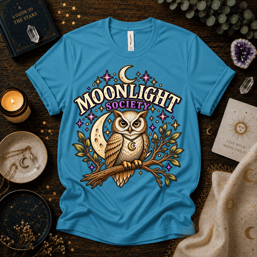 Moonlight Society cute celestial graphic t-shirt cozy flat lay in aqua.
