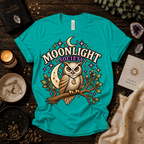 Moonlight Society cute celestial graphic t-shirt cozy flat lay in heather sea green.