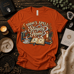 Today's Spell celestial witchy graphic t-shirt cozy flat lay in burnt orange.