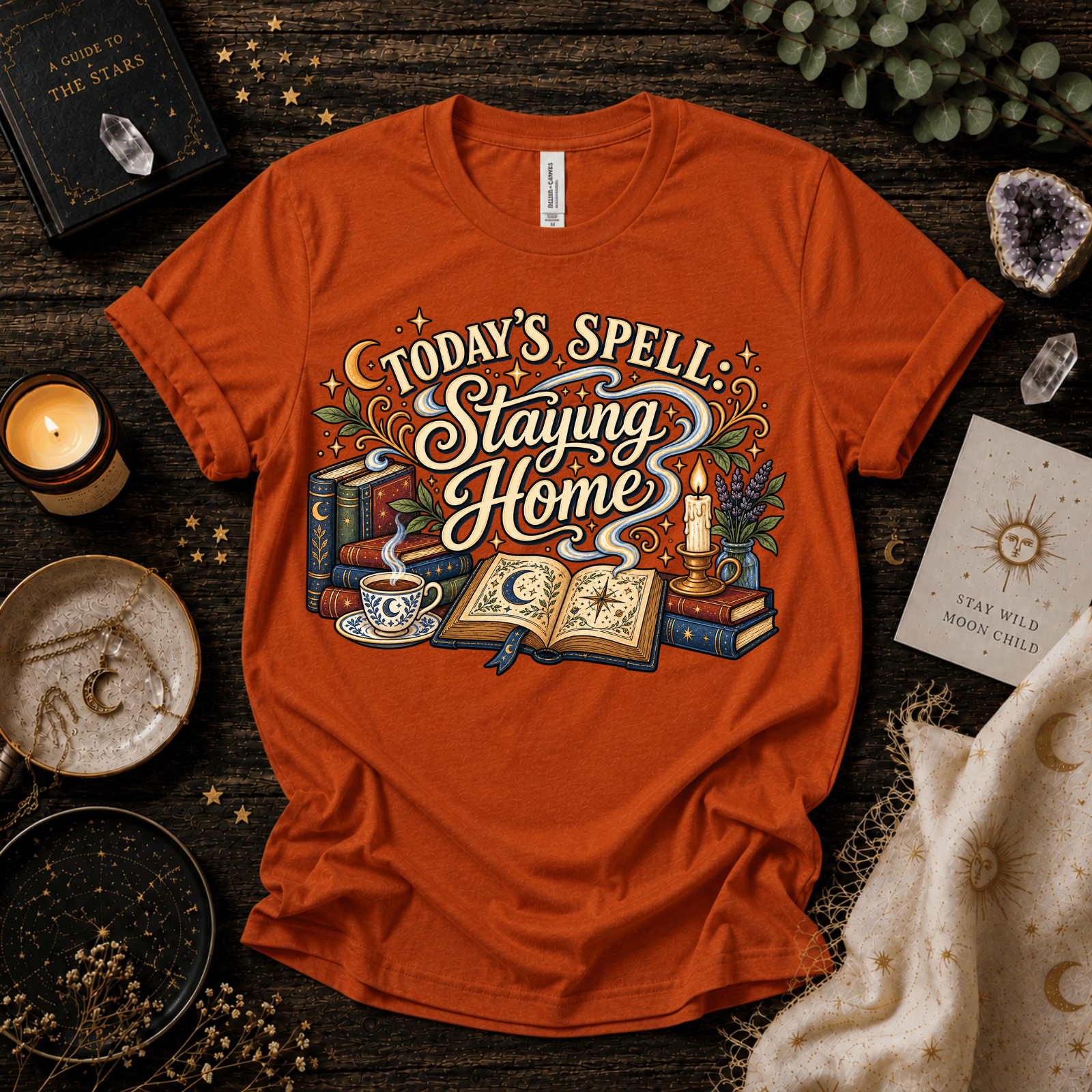 Today's Spell celestial witchy graphic t-shirt cozy flat lay in burnt orange.