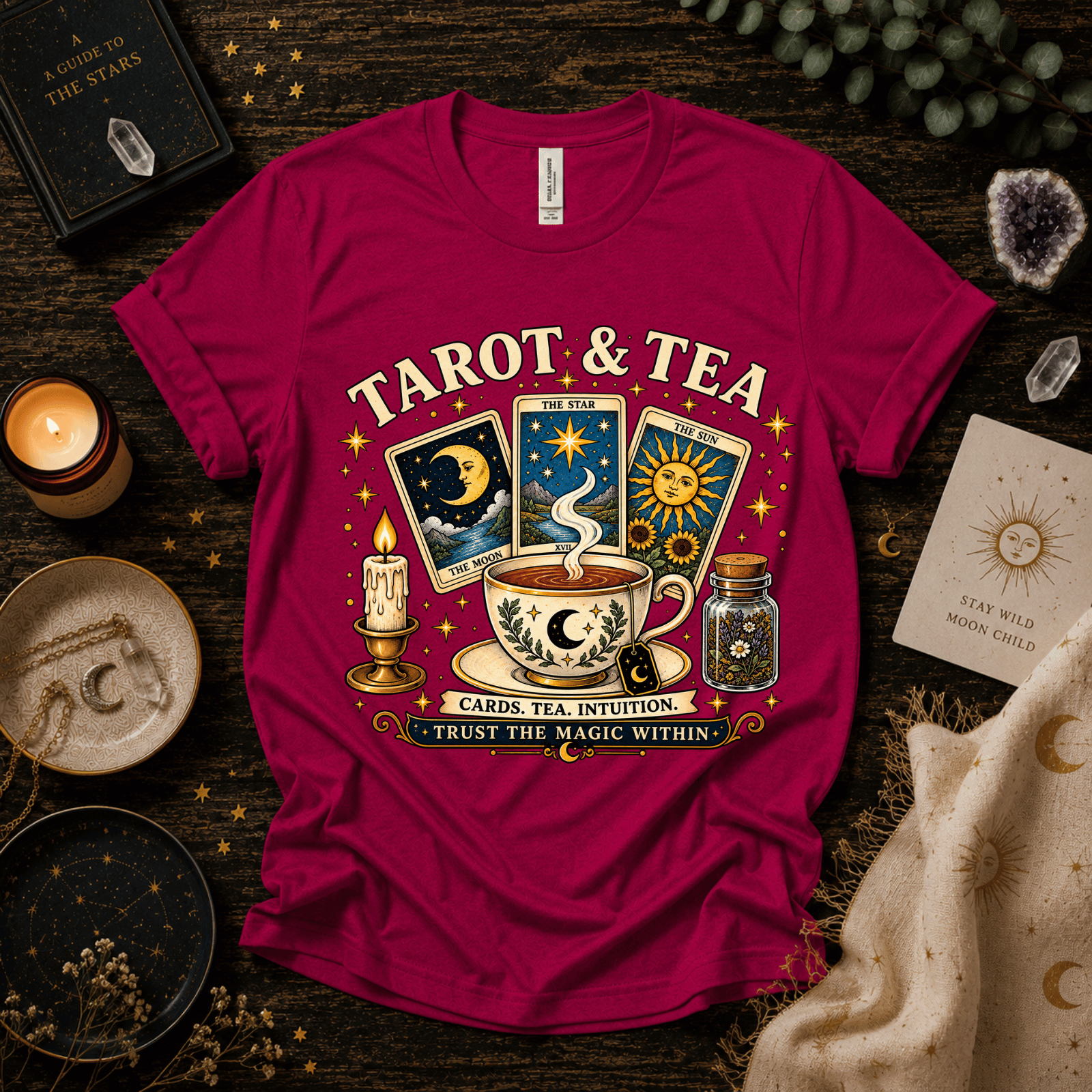 Tarot & Tea celestial tarot graphic t-shirt cozy flat lay in berry.