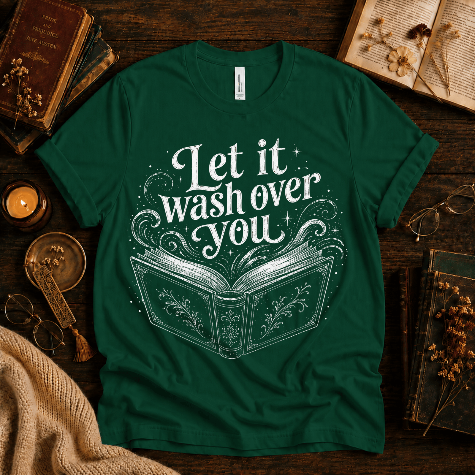 Let It Wash Over You whimsical book graphic t-shirt cozy flat lay in evergreen.