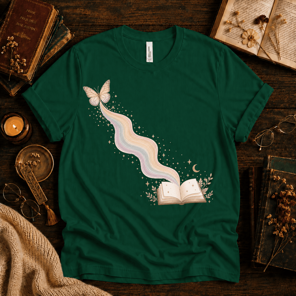 Rainbow Book whimsical book graphic t-shirt cozy flat lay in evergreen.
