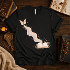 Rainbow Book whimsical book graphic t-shirt cozy flat lay in vintage black.