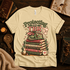 Protecting My TBR cute book graphic t-shirt cozy flat lay in natural.