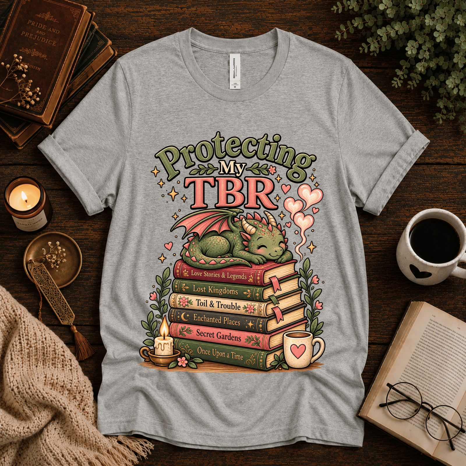 Protecting My TBR cute book graphic t-shirt cozy flat lay in athletic heather.