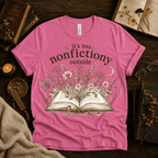 Nonfictiony whimsical book graphic t-shirt cozy flat lay in charity pink.