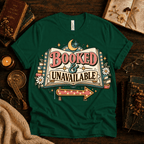 Booked & Unavailable cute book graphic t-shirt cozy flat lay in evergreen.