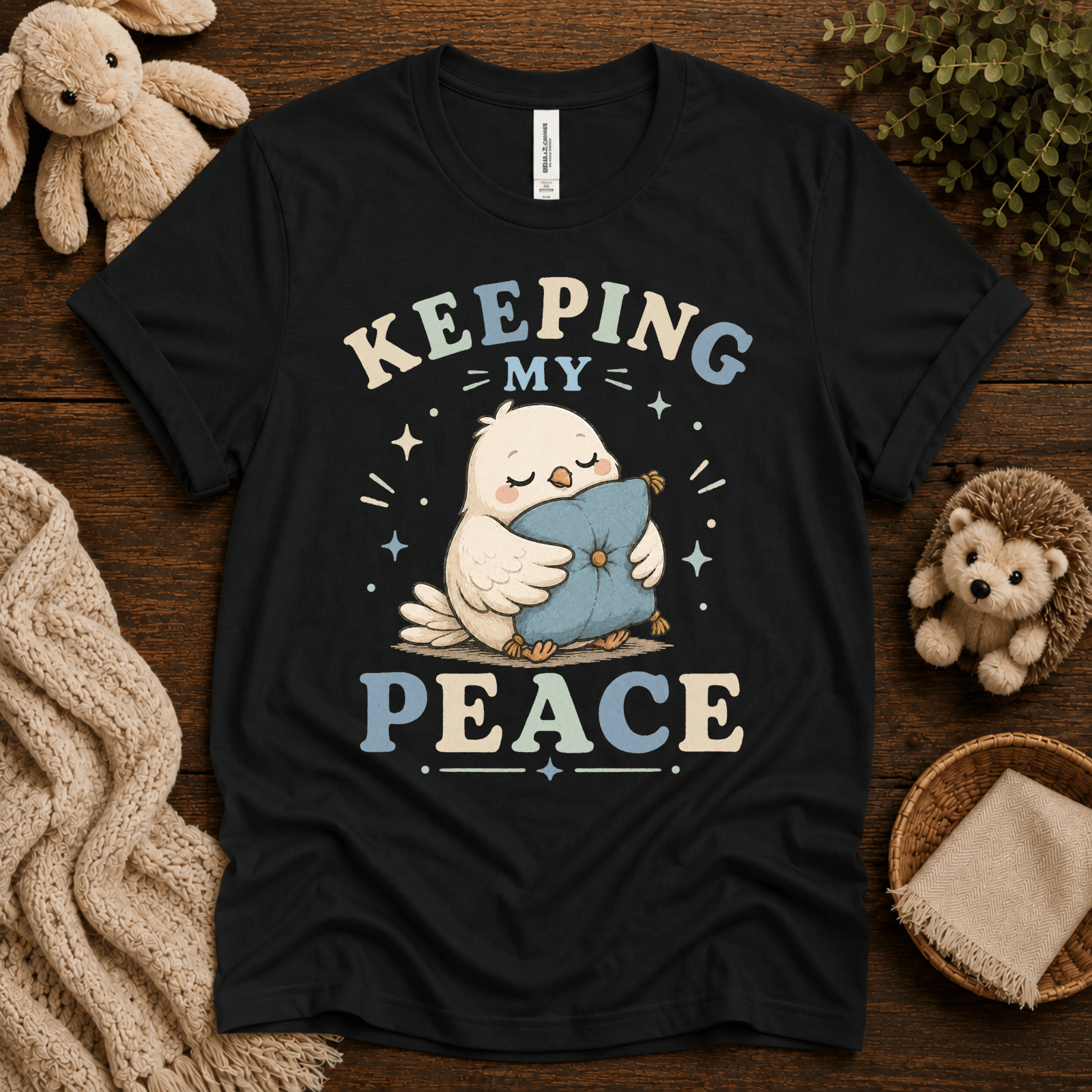Keeping My Peace cute animal graphic t-shirt cozy flat lay in vintage black.