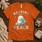 Keeping My Peace cute animal graphic t-shirt cozy flat lay in burnt orange.