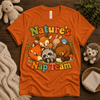 Nature's Nap Team cute animal graphic t-shirt cozy flat lay in burnt orange.