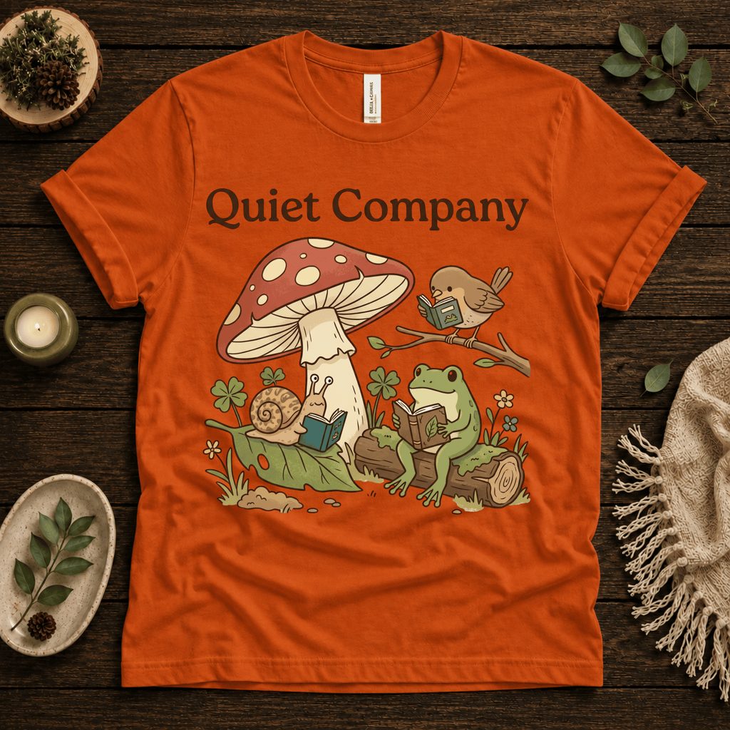 Quiet Company nature lover graphic t-shirt cozy flat lay in burnt orange.