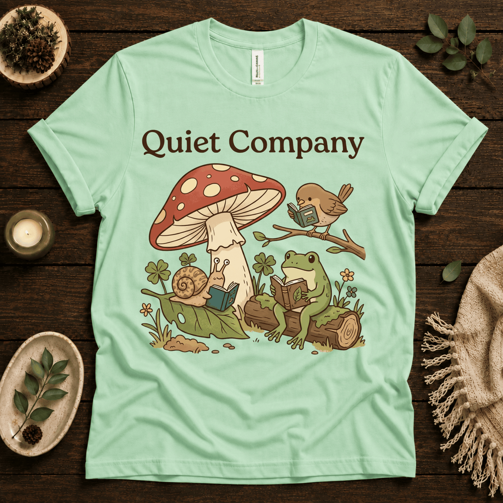 Quiet Company nature lover graphic t-shirt cozy flat lay in mint.