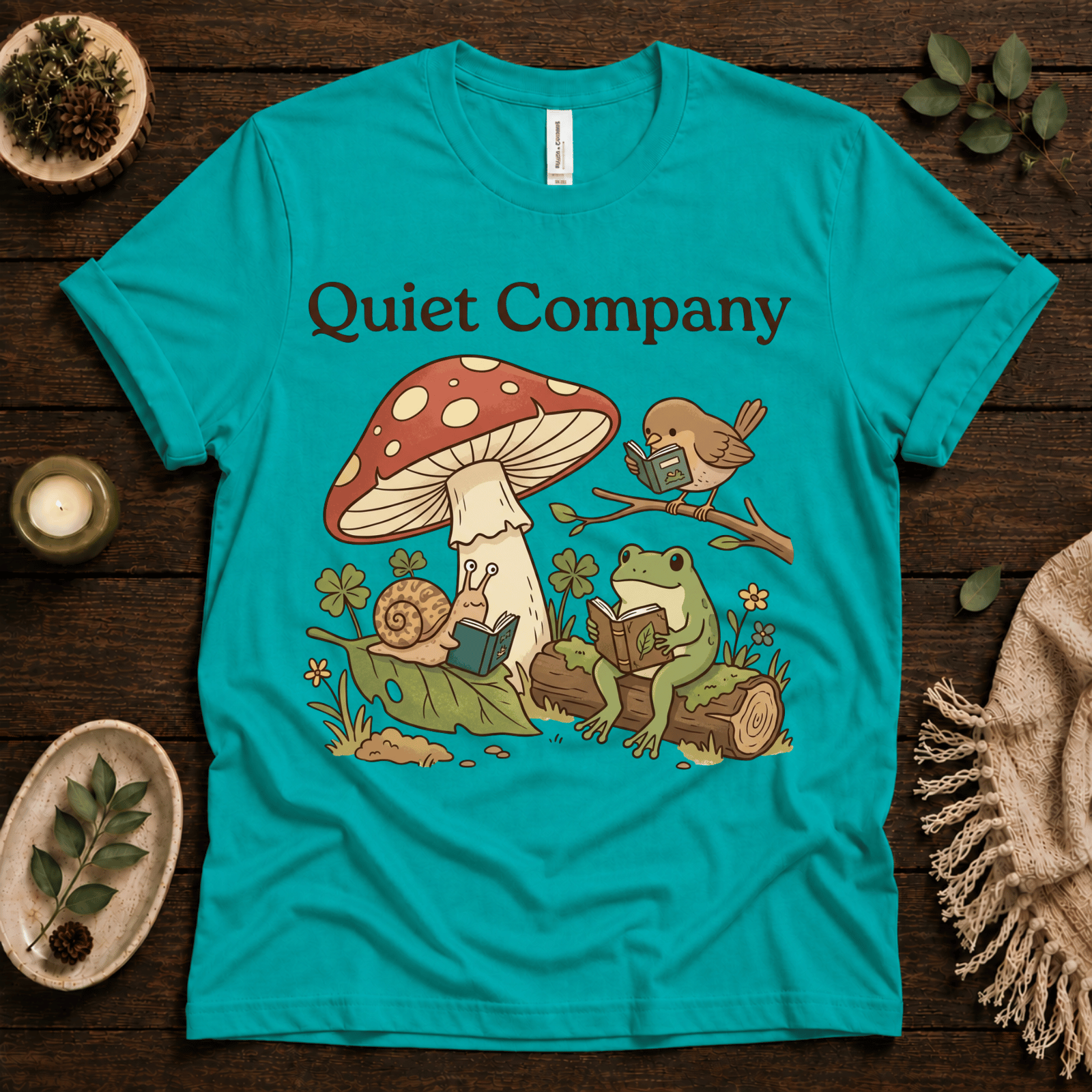 Quiet Company nature lover graphic t-shirt cozy flat lay in heather sea green.
