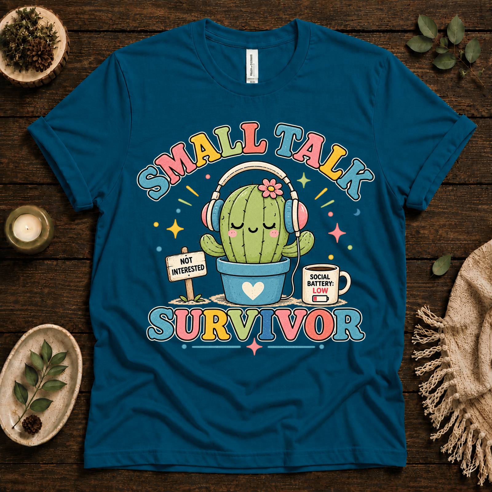 Small Talk Survivor funny plant graphic t-shirt cozy flat lay in deep teal.