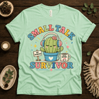 Small Talk Survivor funny plant graphic t-shirt cozy flat lay in mint.