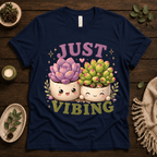 Succulent Vibing funny plant graphic t-shirt cozy flat lay in navy.