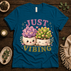Succulent Vibing funny plant graphic t-shirt cozy flat lay in deep teal.