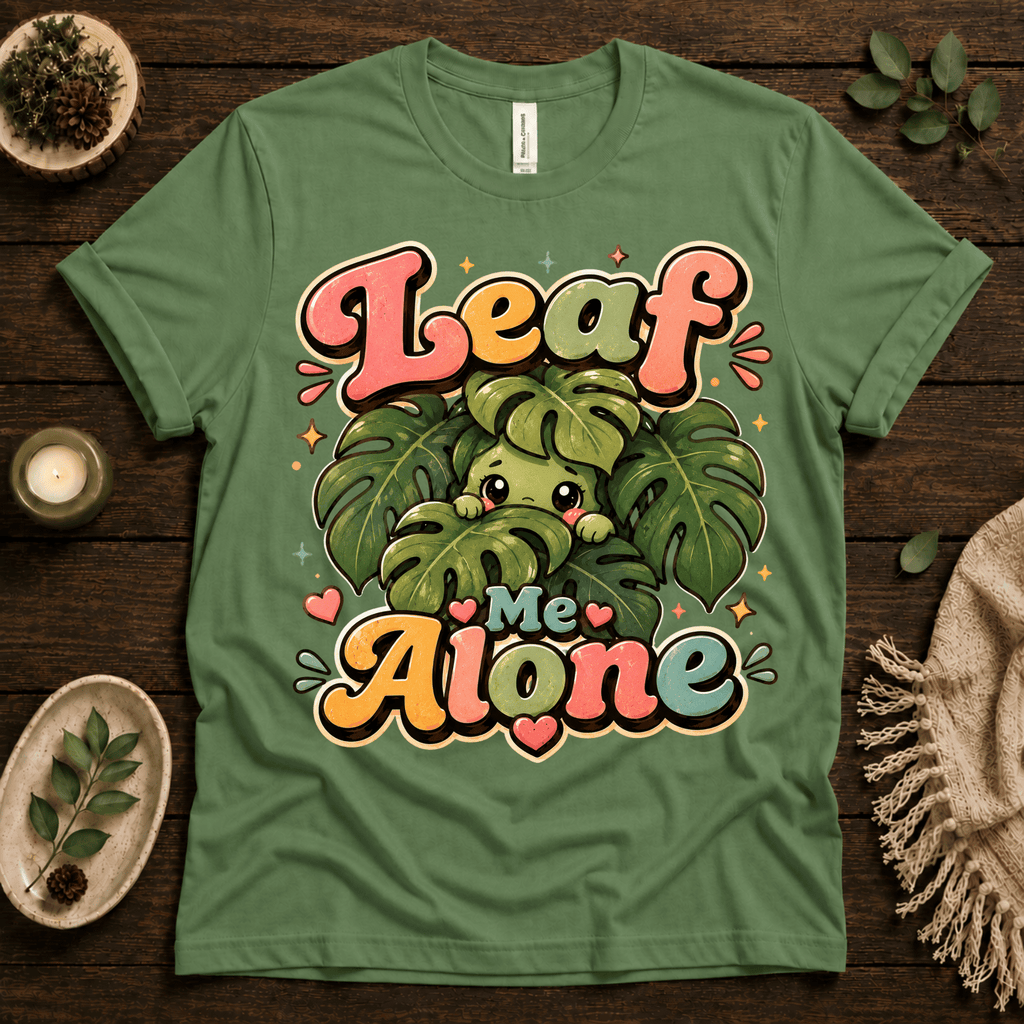 Leaf Me Alone funny nature graphic t-shirt cozy flat lay in leaf.