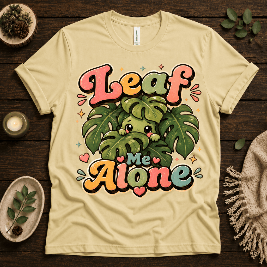 Leaf Me Alone funny nature graphic t-shirt cozy flat lay in natural.