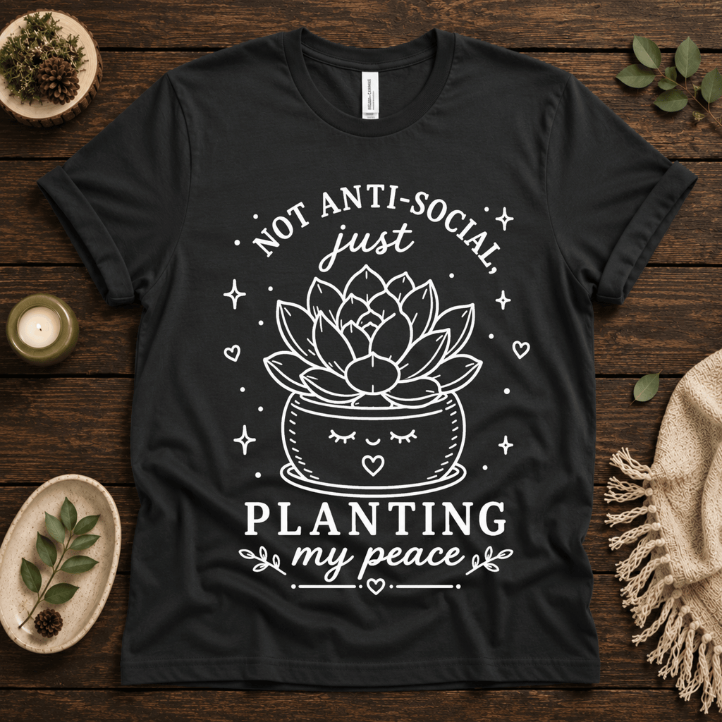 Planting My Peace cute plant graphic t-shirt cozy flat lay in vintage black.