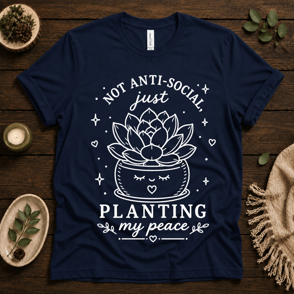 Planting My Peace cute plant graphic t-shirt cozy flat lay in navy.