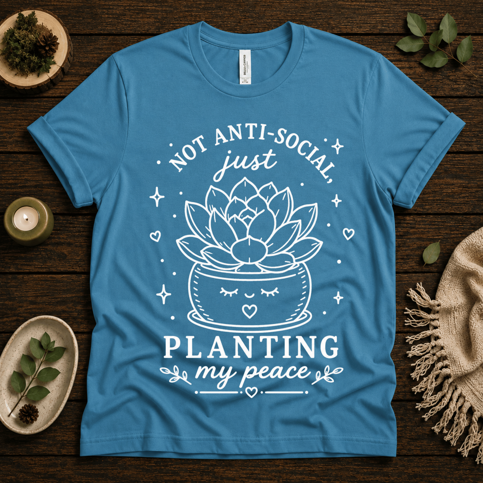 Planting My Peace cute plant graphic t-shirt cozy flat lay in aqua.