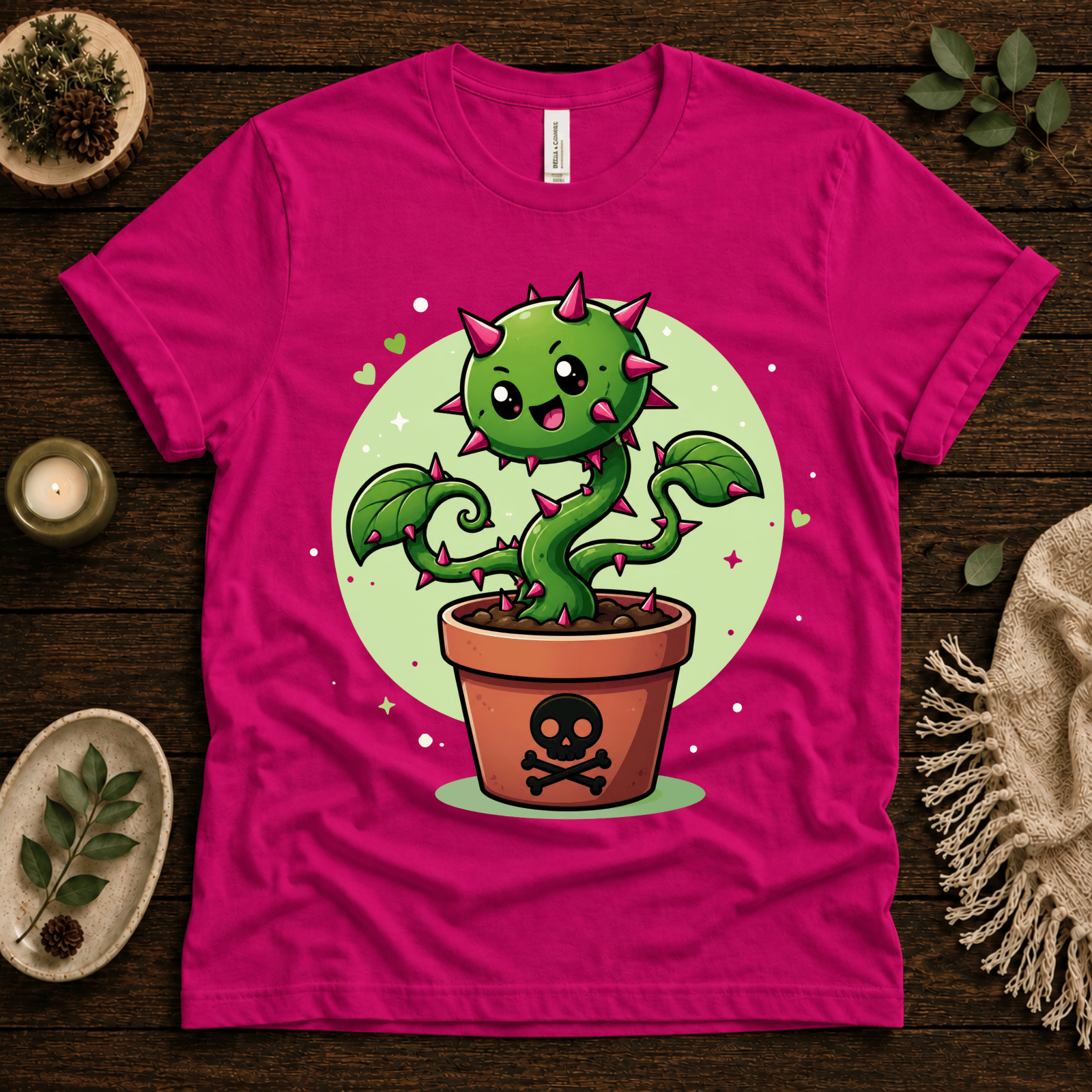 Poison Ivy funny plant graphic t-shirt cozy flat lay in charity pink.