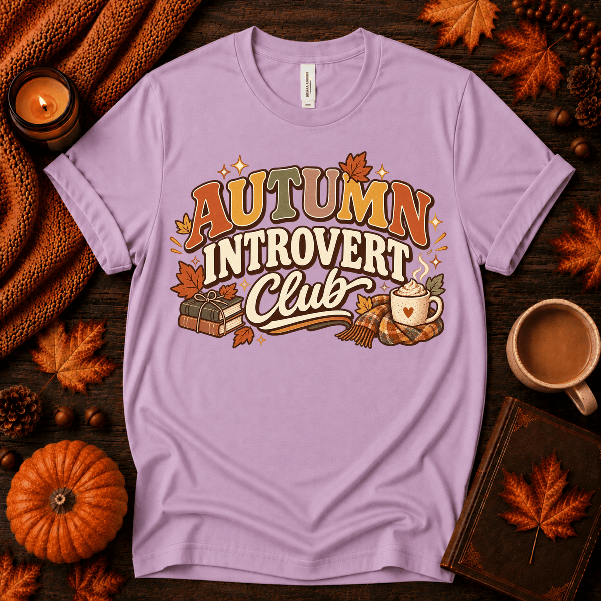 Autumn Introvert Club cute fall graphic t-shirt cozy flat lay in lilac.