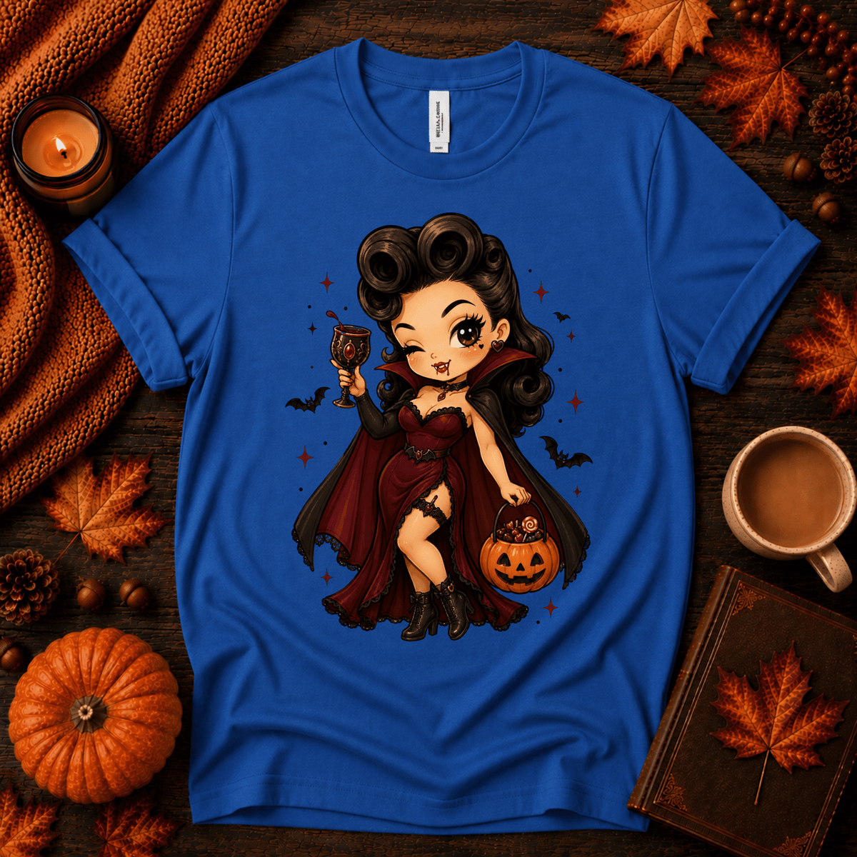 Vampire Vanessa halloween pinup graphic t-shirt cozy flat lay in true royal.