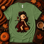 Vampire Vanessa halloween pinup graphic t-shirt cozy flat lay in leaf.