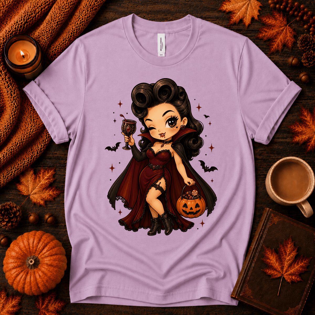 Vampire Vanessa halloween pinup graphic t-shirt cozy flat lay in lilac.