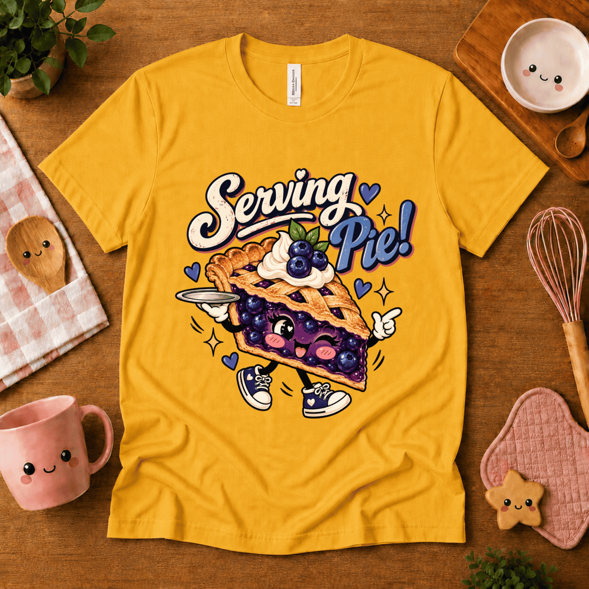 Serving Pie retro food graphic t-shirt cozy flat lay in gold.